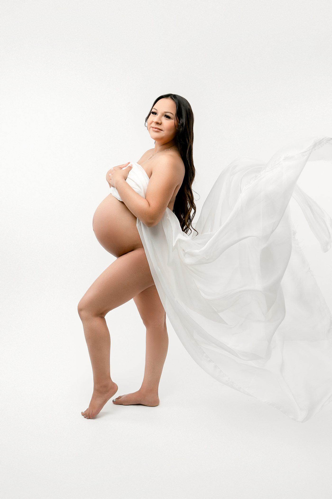 Maternity Portraits, Fresno, Clovis, Studio, All white, flowy silk, maternity pose