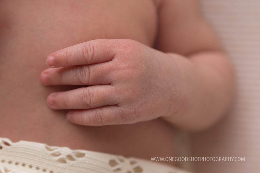newborn girl hand, closeup shot