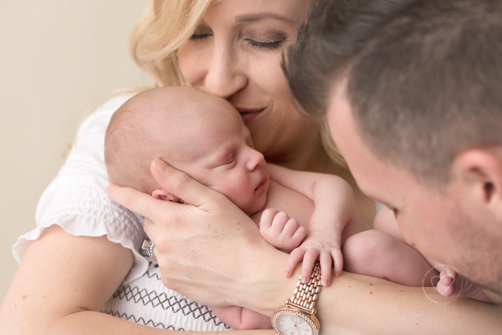 newborn boy kissed by mom, fresno newborn photographer
