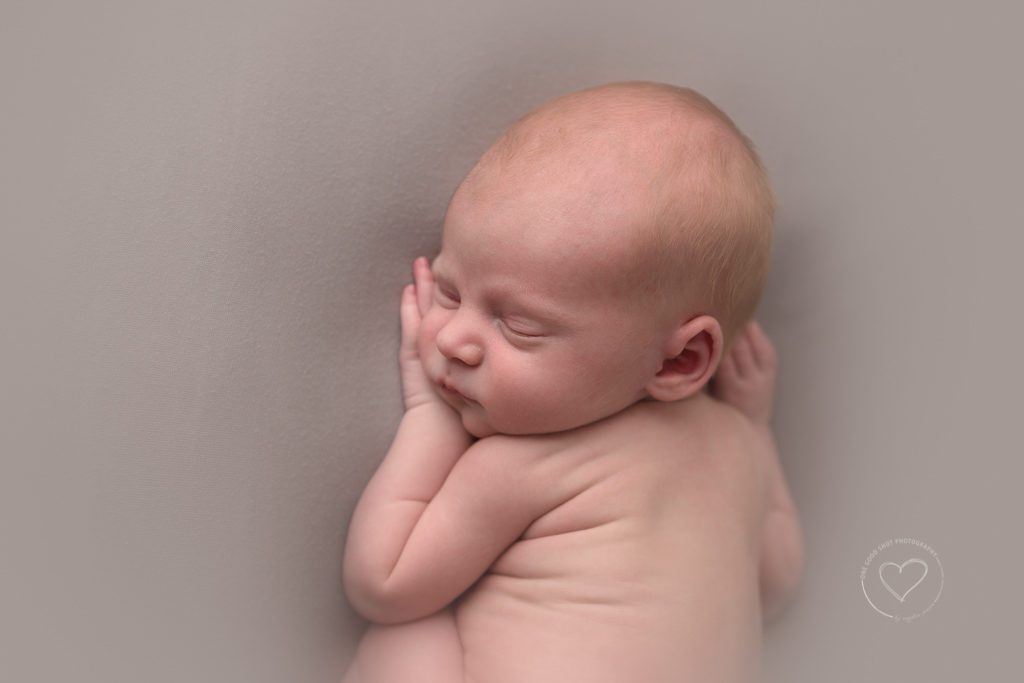 newborn boy, profile pic, gray backdrop, fresno newborn photographer