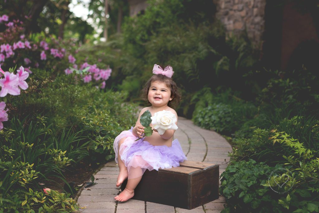 One Good Shot Photography | Fresno Baby Photographer, Fresno, Clovis, CA, 1 year, First Birthday, Miestone Session, Garden, Secret Garden, Baby Girl on box, tutu, Roses