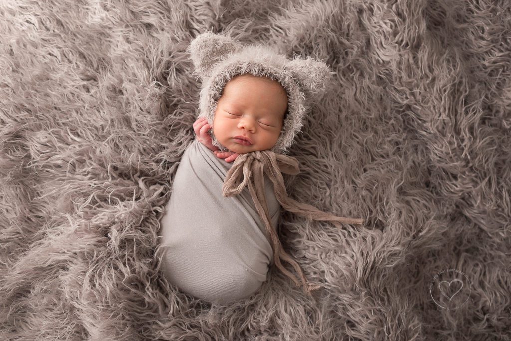 newborn boy in teddy bear bonnet, Fresno newborn photographer