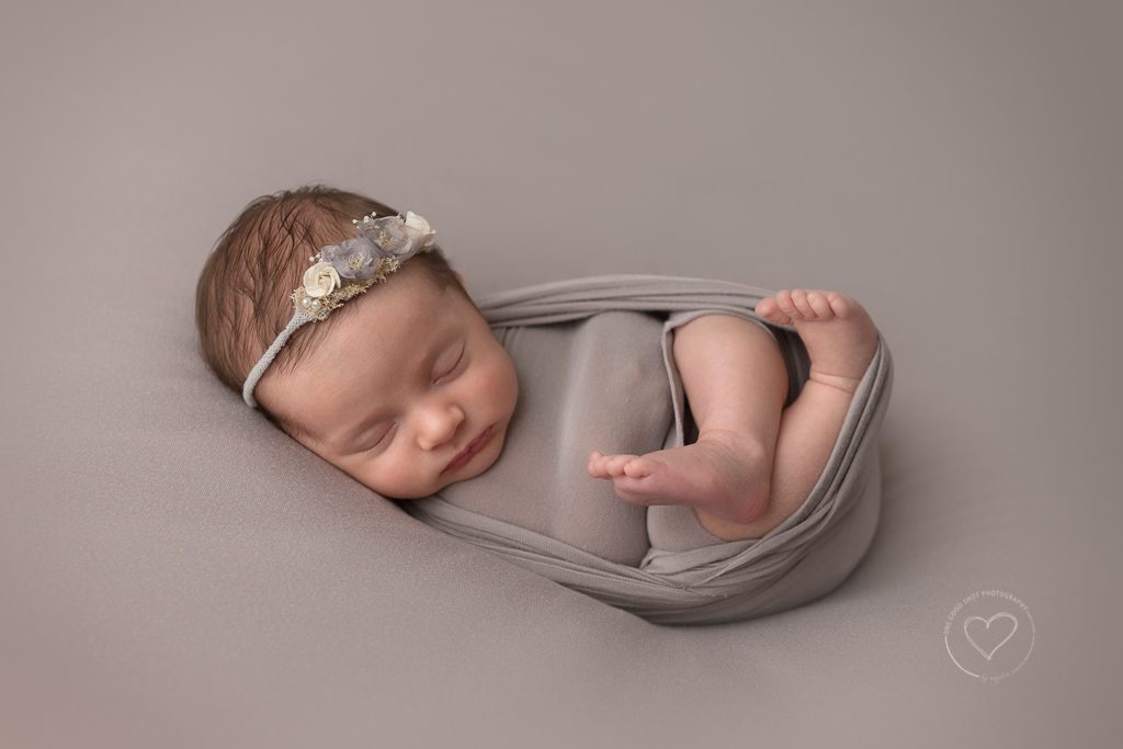 Fresno newborn Photographer | One Good Shot Photography, newborn girl, gray backdrop, gray wrap, baby feet, natural newborn, neutral