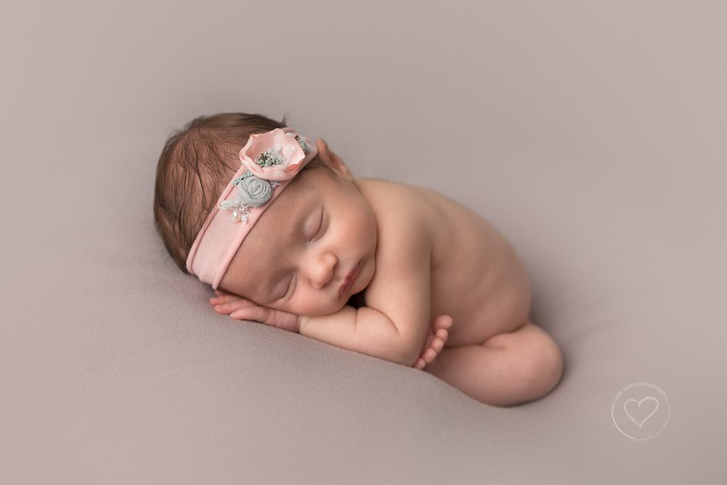 One Good Shot Photography | Fresno Newborn Photographer, baby girl, gray backdrop, pink tieback, taco pose