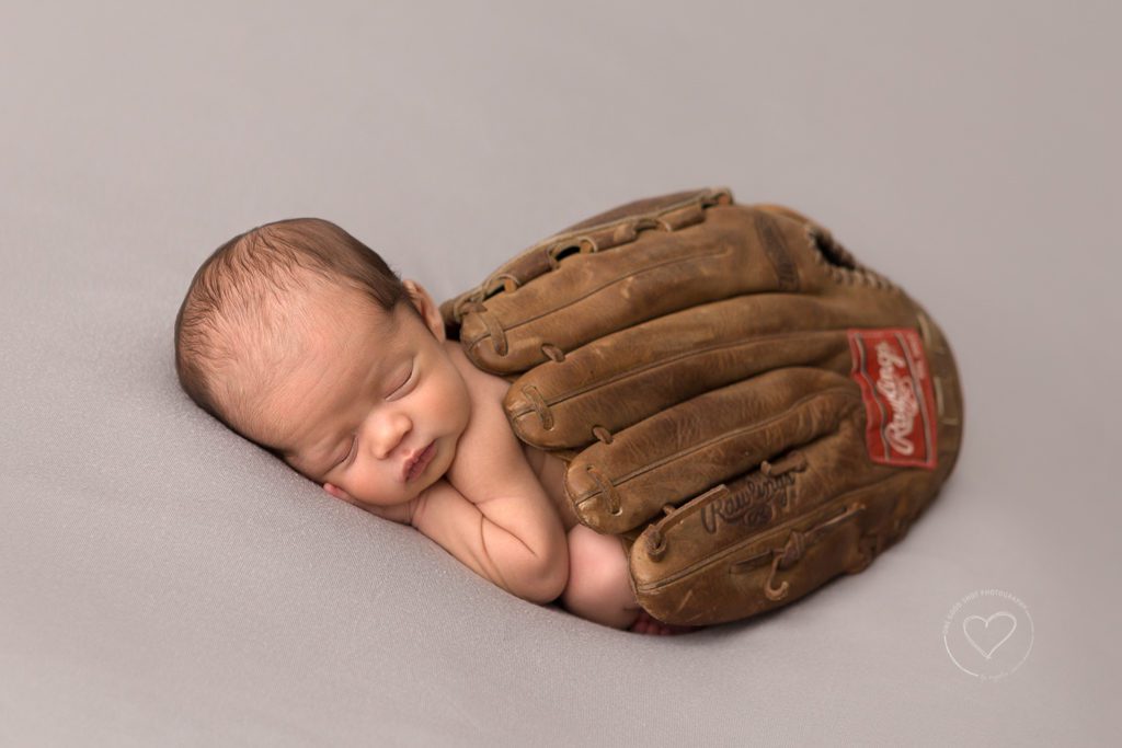Fresno newborn photographer, baby in baseball glove
