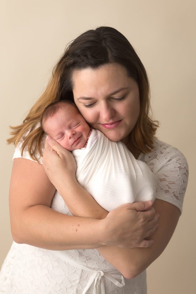 Fresno Newborn Photographer, One Good Shot Photography, Newborn boy in mom's arms