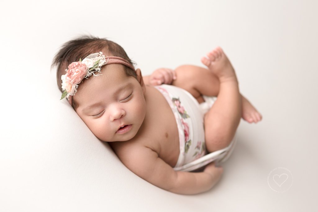 newborn girl, floral wrap, white background, fresno photographer