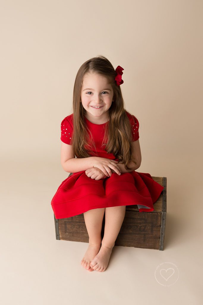 Little girl, 3 year old, Milestone Session, red dress, sitting on box