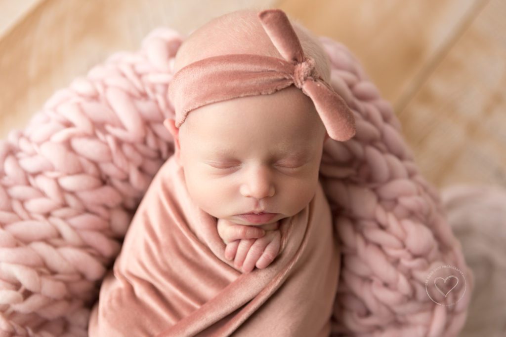 Newborn baby photographer, fresno, clovis, twin girl, wrapped in pink, pink bow headband