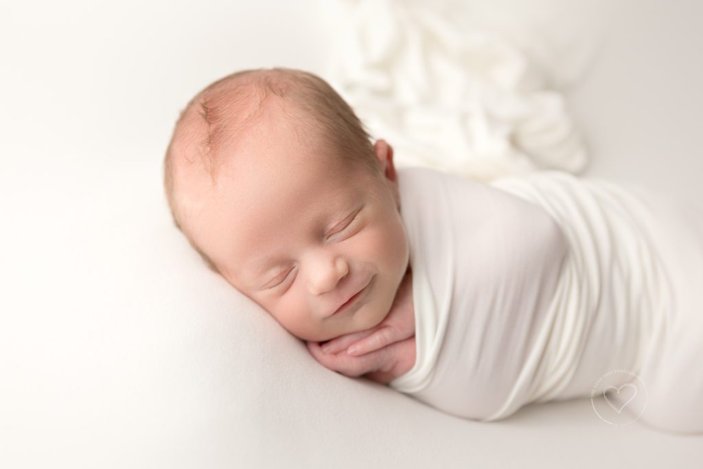 Newborn baby photographer, fresno, clovis, newborn twin boy, smiling