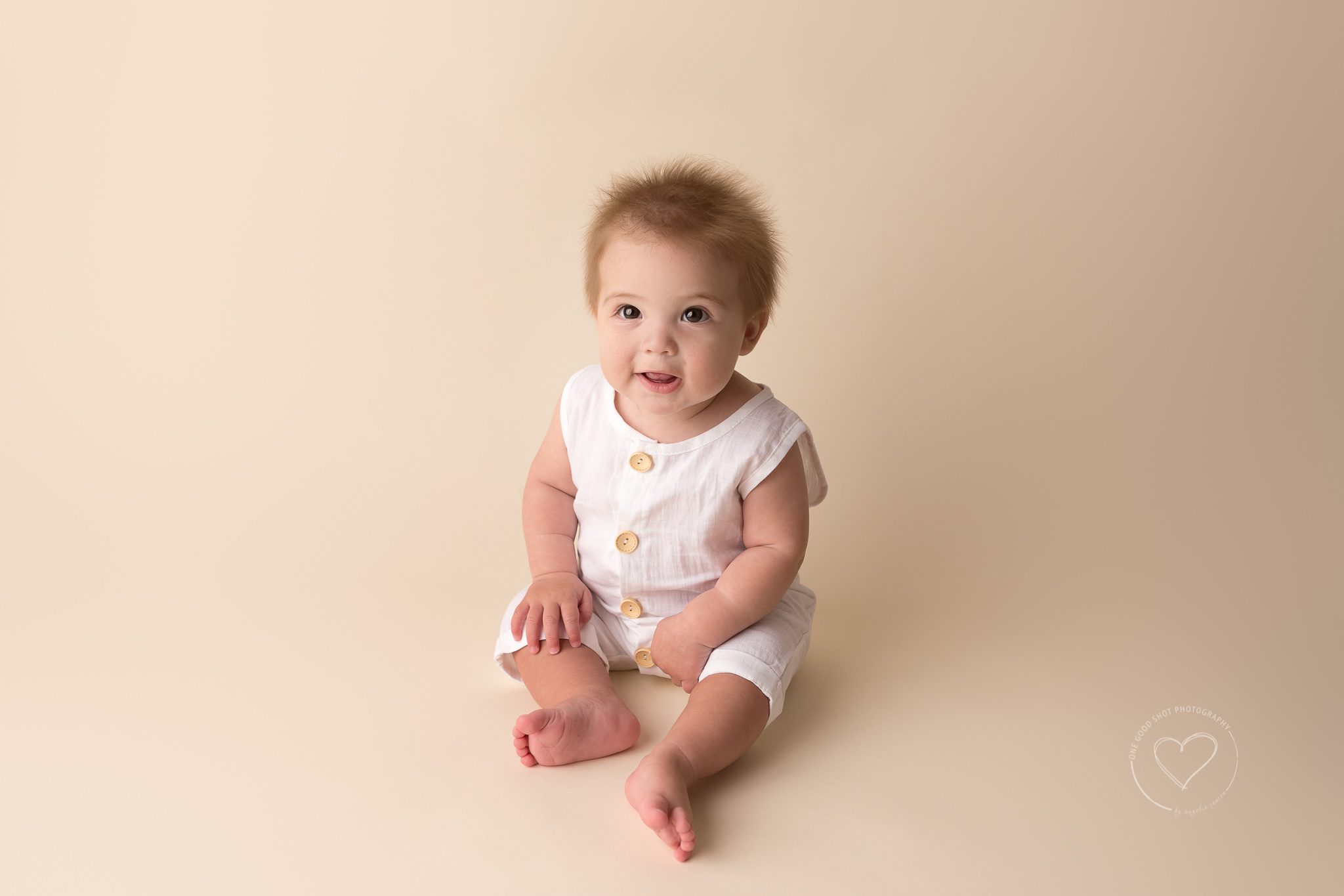 baby boy, 6 months old, sitter, wearing white linen romper, Fresno baby photographer