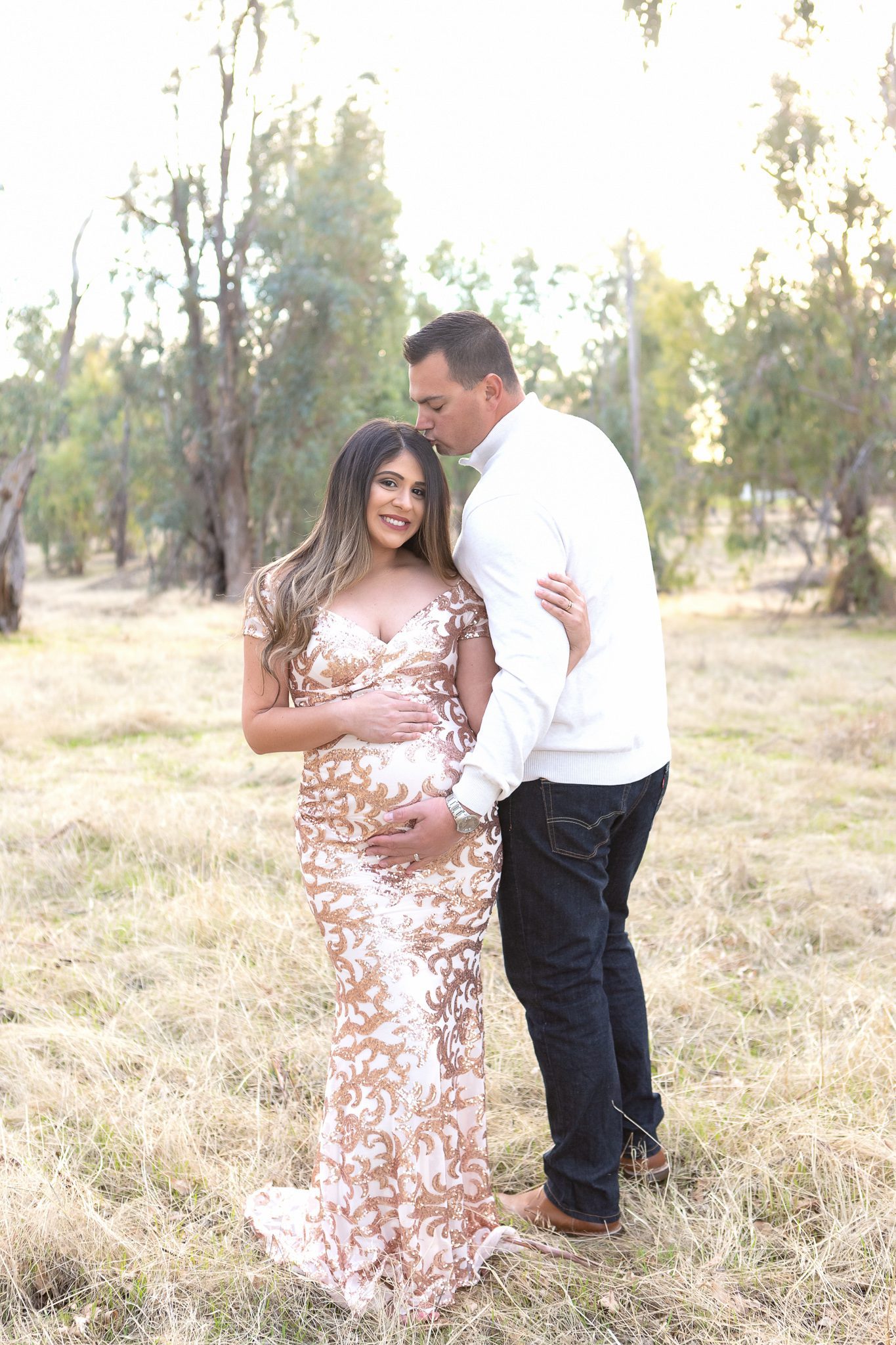 Fresno Maternity Photographer, Husband and wife in a field, pregnancy photos