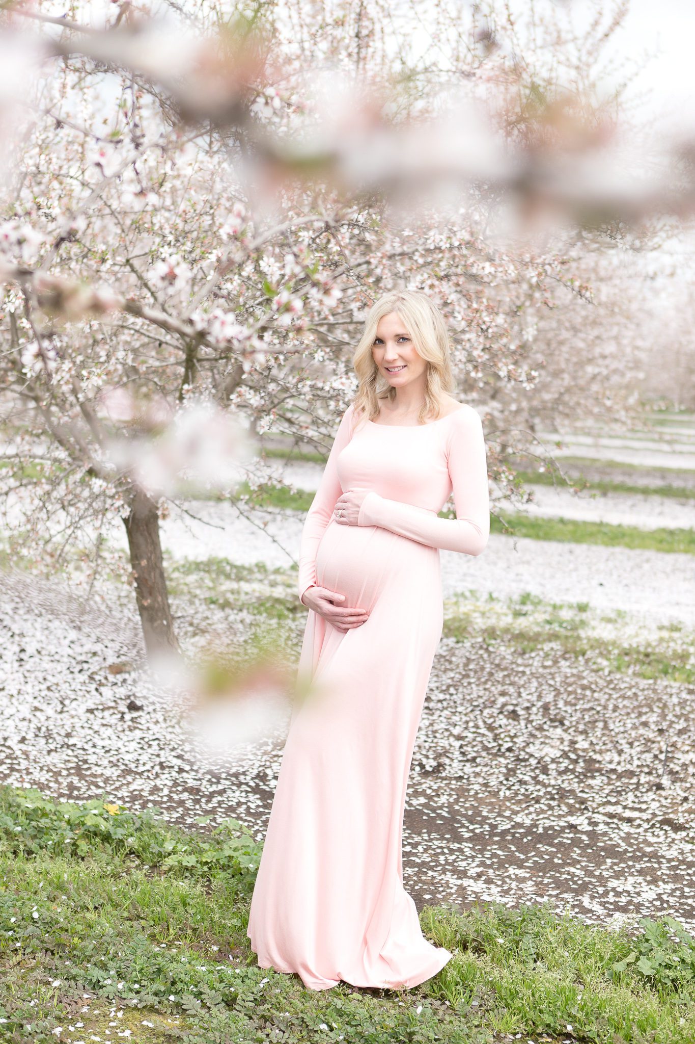blossom maternity session, pink maternity dress, baby bump 