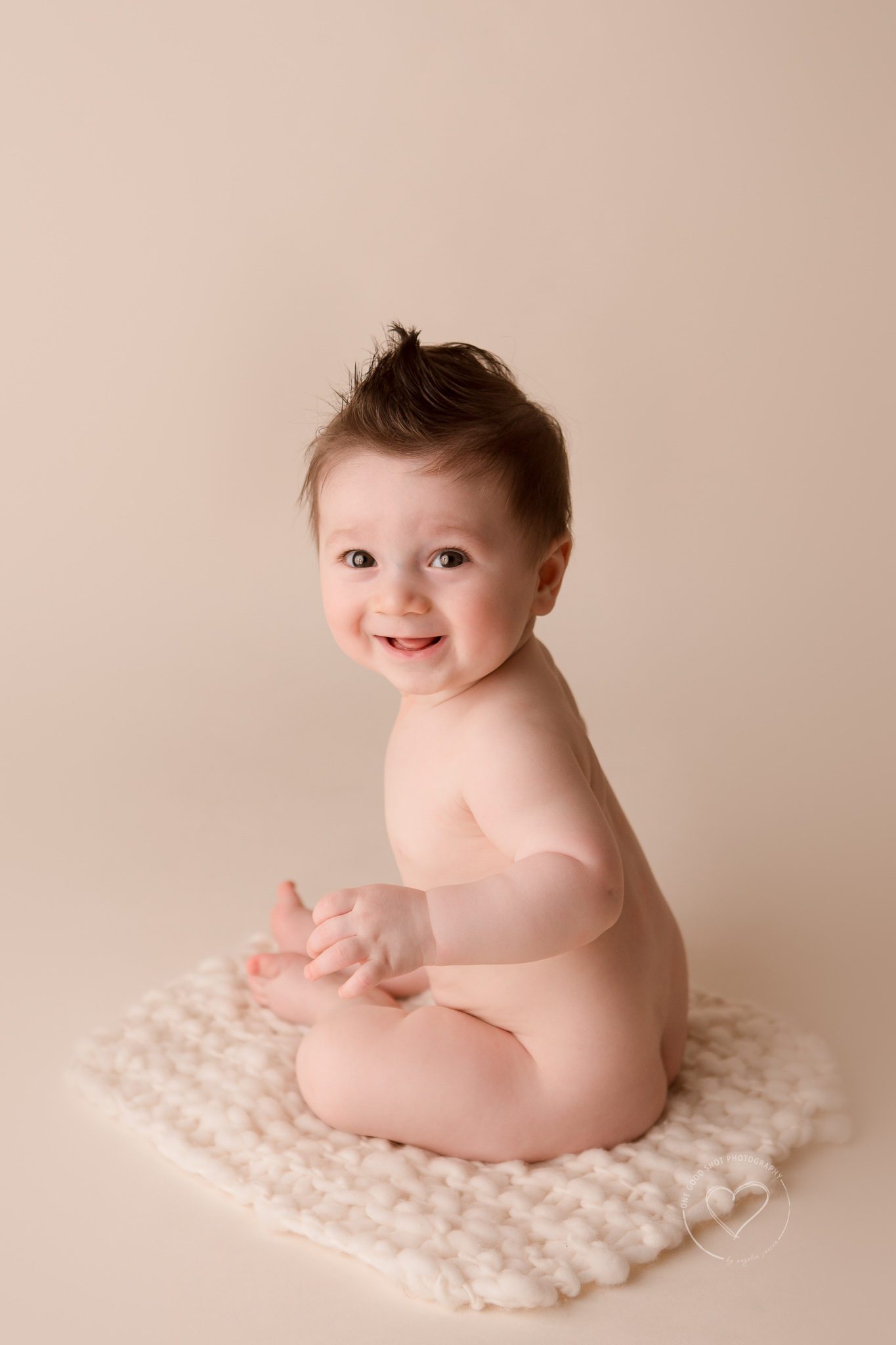 Fresno Baby Photographer, 6 month old boy, sitting naked, smiling