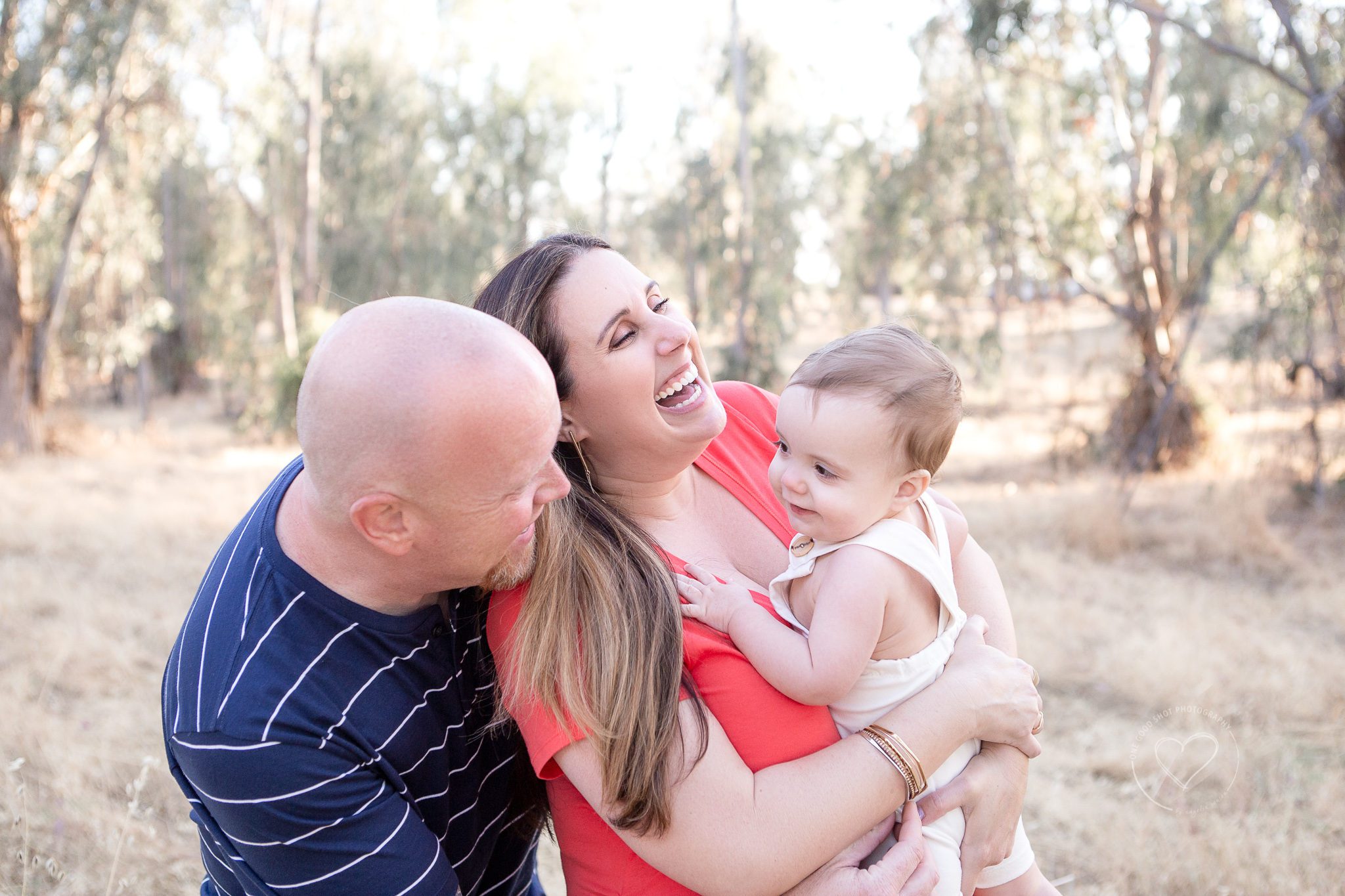 Happy family pictures, laughing in a field, Fresno Family Photographer