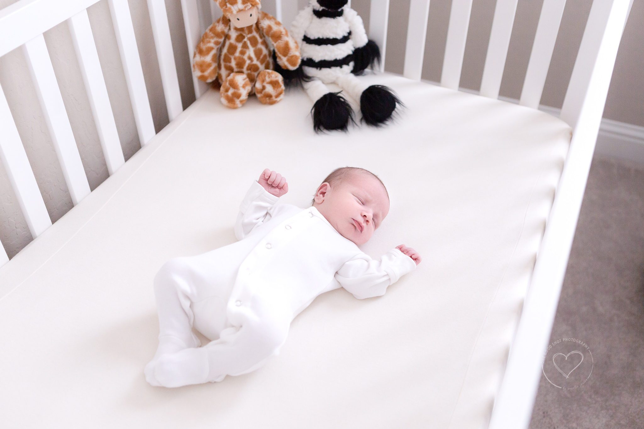 fresh 48 session, newborn baby boy wearing white sleeper, sleeping in crib,fresno, one good shot