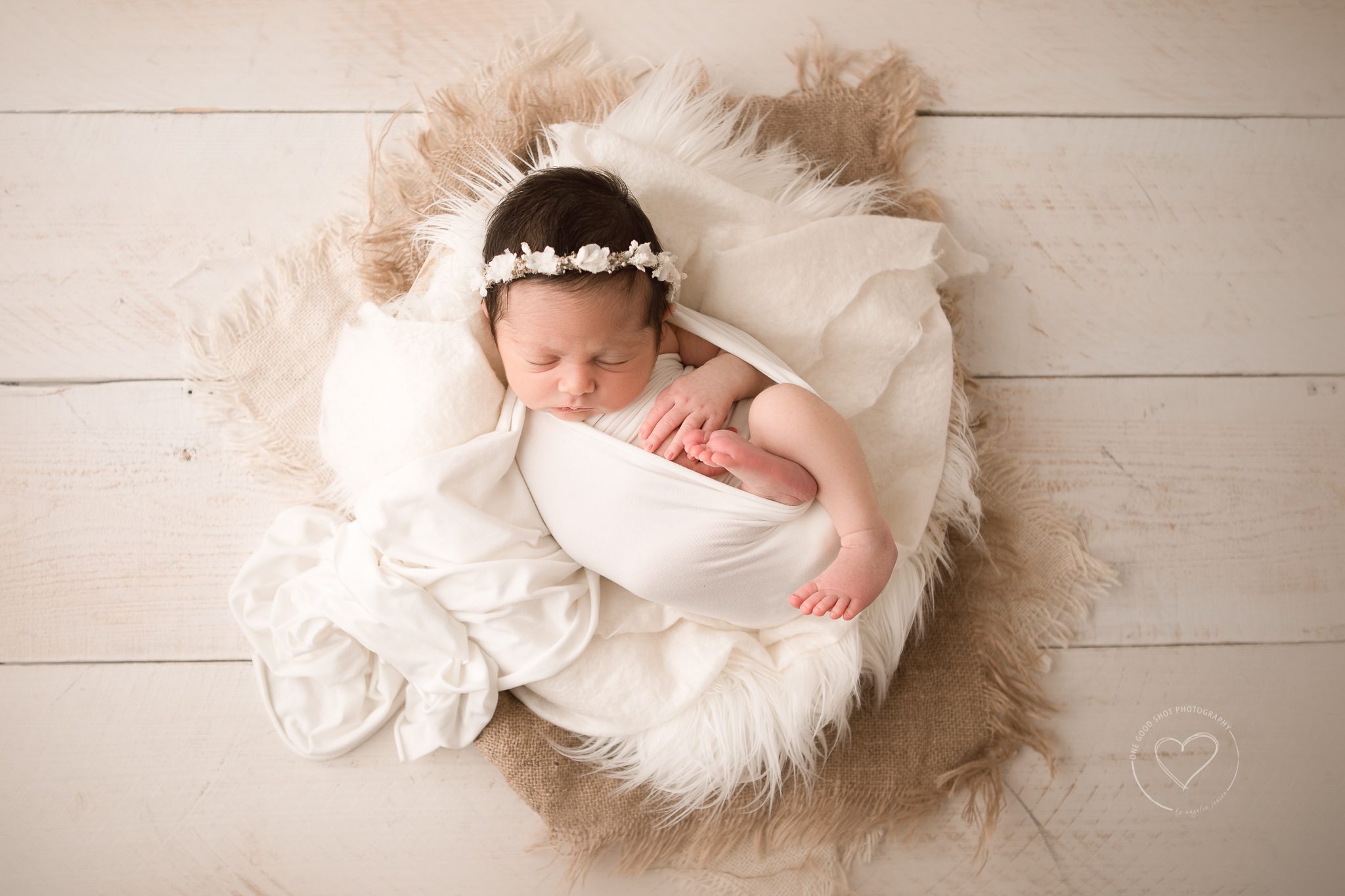 fresno newborn photographer, neutral, baby wrapped in white, laying in bowl, shot from above