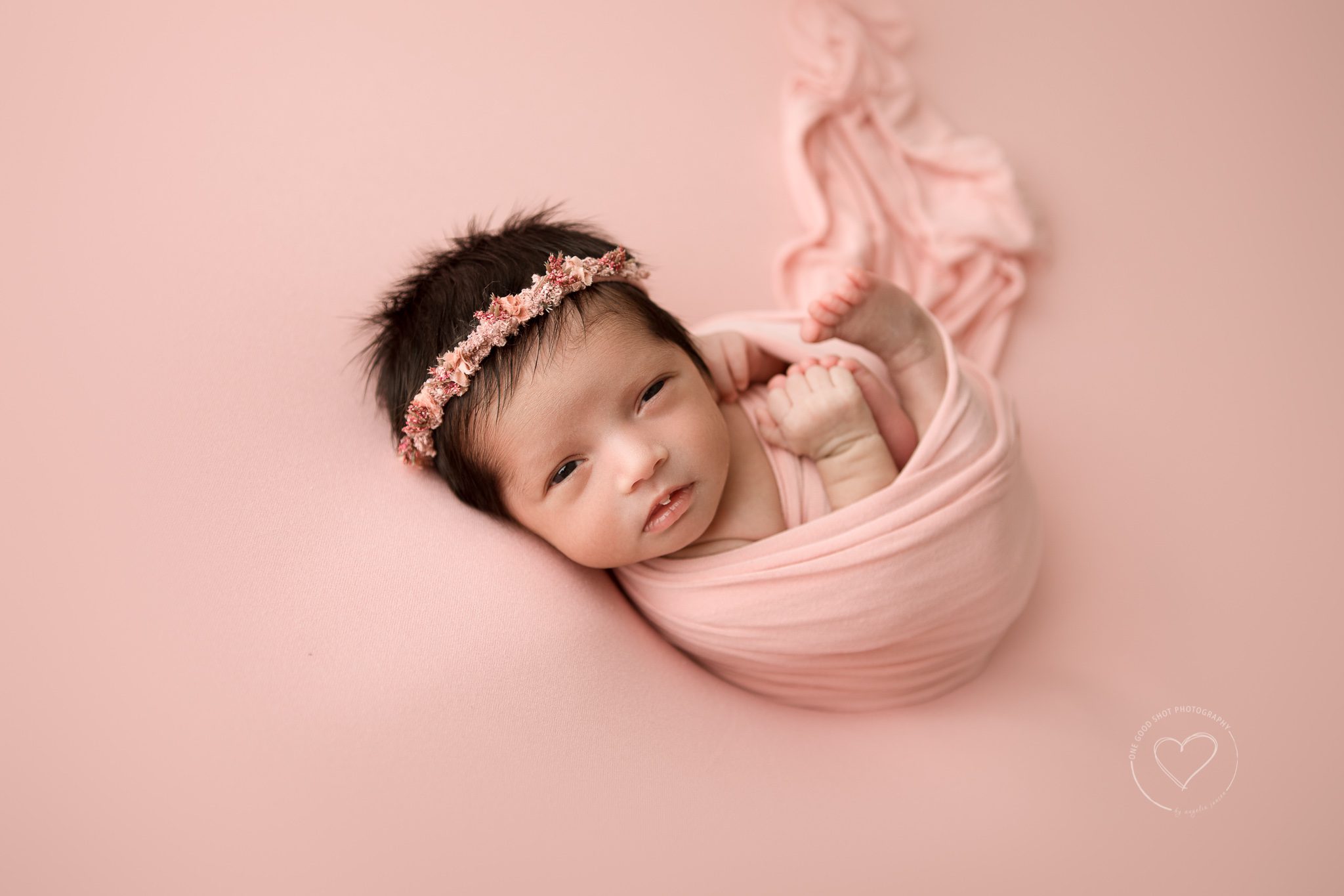 fresno newborn photographer, wrapped huck finn pose, pink, floral halo
