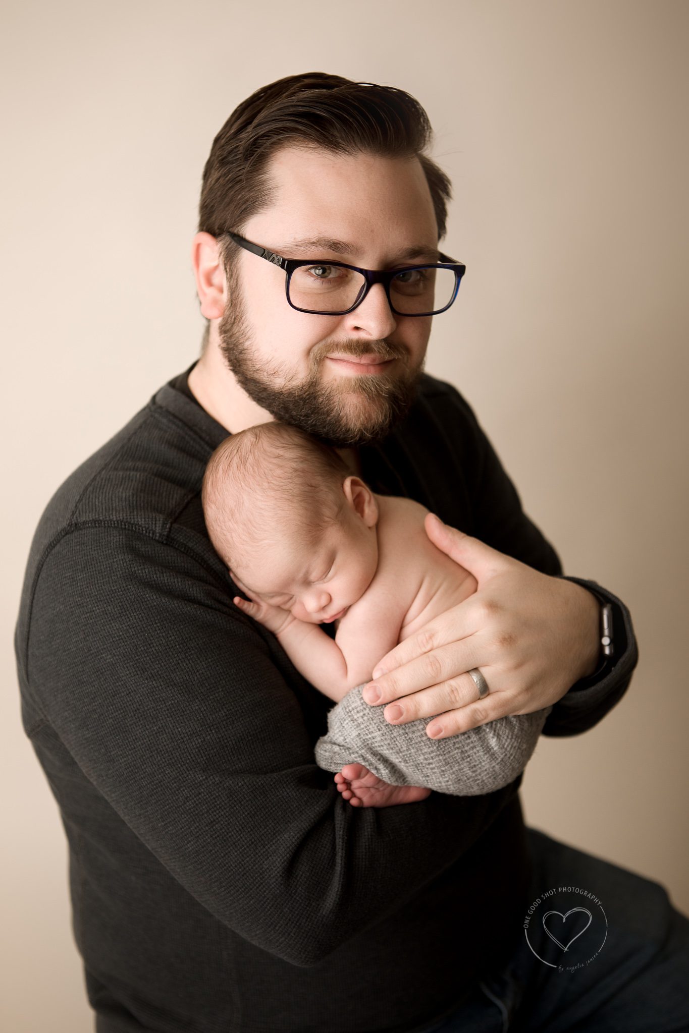 dad holding newborn baby, fresno photographer
