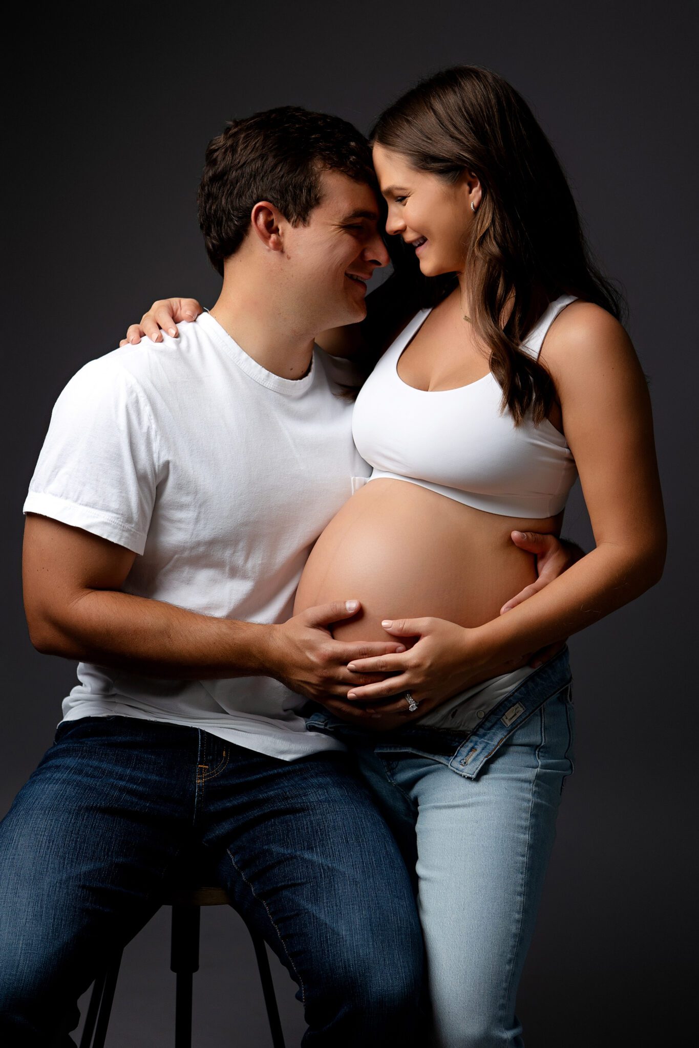 husband wife pregnancy photo shoot, maternity pictures, calvin klein white, denim, fresno, clovis, california